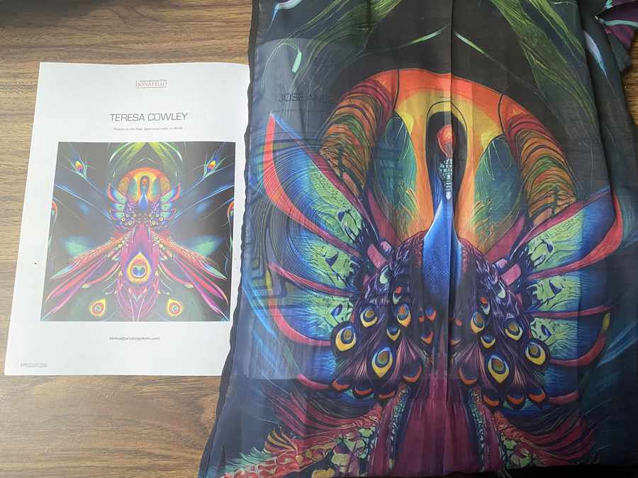 Phoenix on the Rise by Teresa Cowley printed in the book "Contemporary Celebrity Masters" directed by Salvatore Russo, and as a printed chiffon scarf.