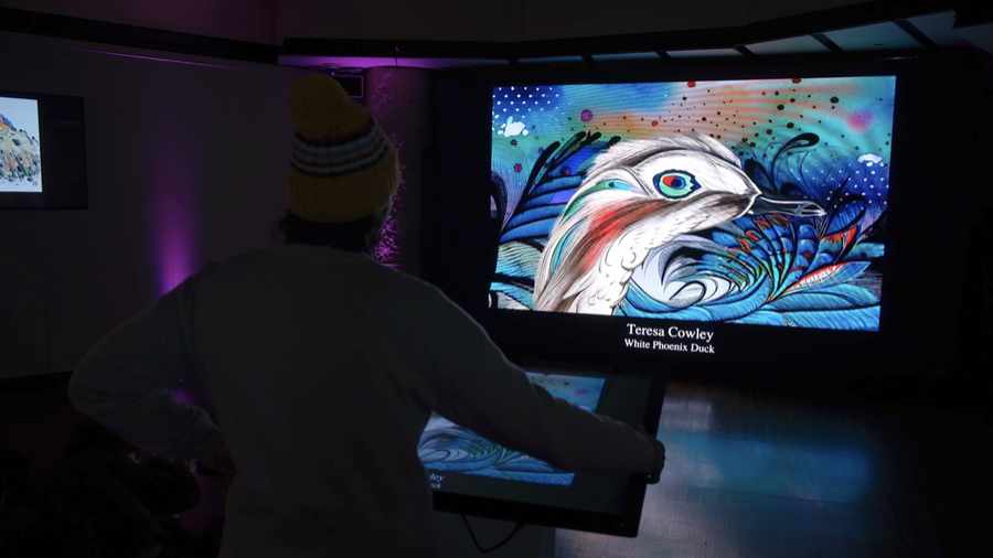 "White Phoenix Duck" by Teresa Cowley being shown at the "Brain Cake" Art Exhibition on LCD touch screens at MADS Art Gallery in Barcelona, Spain.